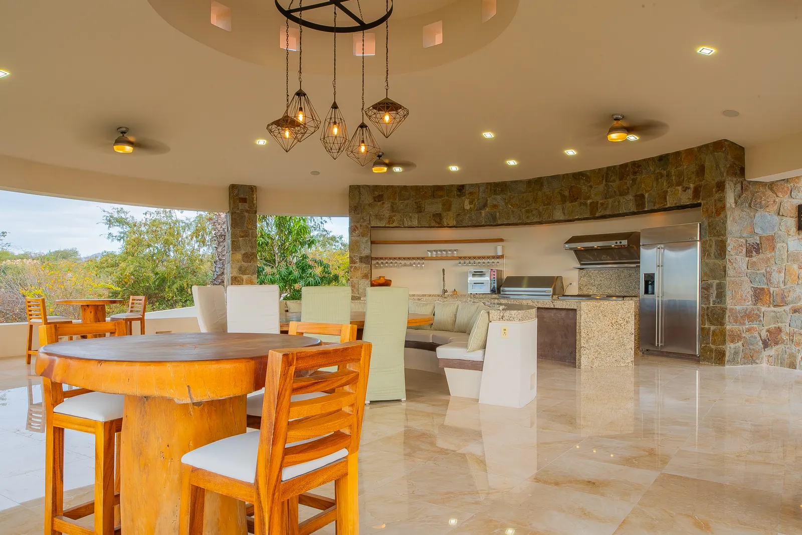 Open-air palapa dining and kitchen