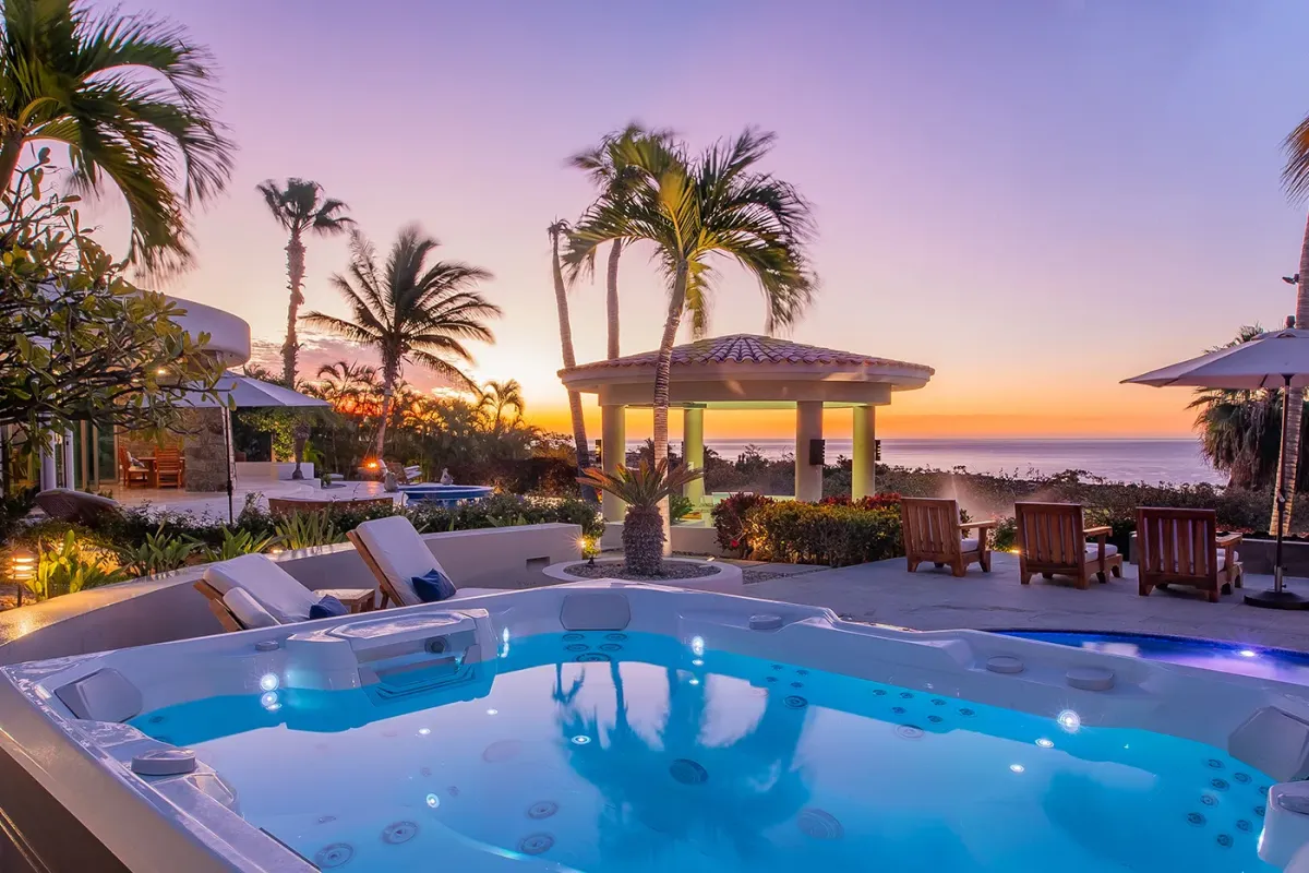 Private jacuzzi at ocean sunset